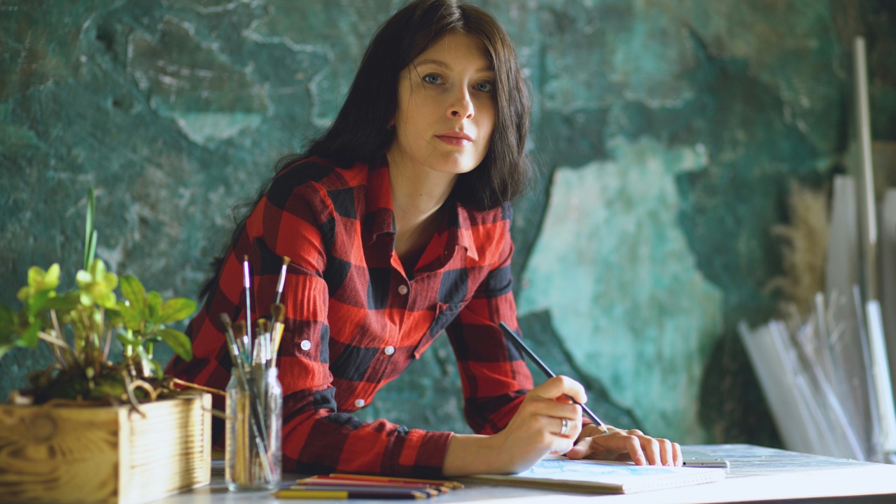 A practitioner at her desk, reading